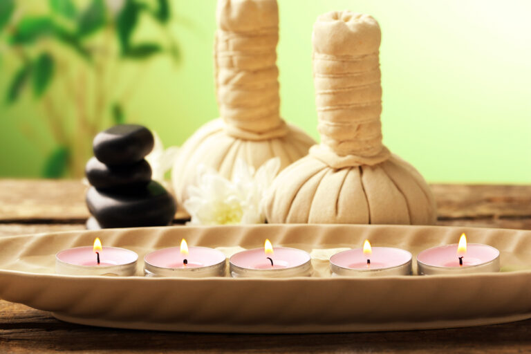 Beautiful spa composition on wooden table, on green background